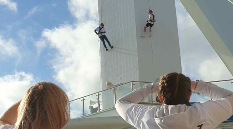 Supporters abseiling down the Spinnaker Tower in Portsmouth
