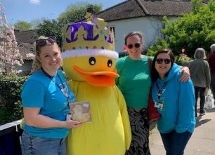 Phyllis Tuckwell staff with the Farnham Duck Race mascot