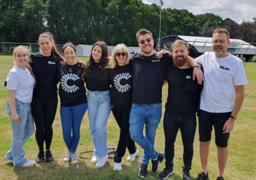 A team of corporate supporters helping at an event