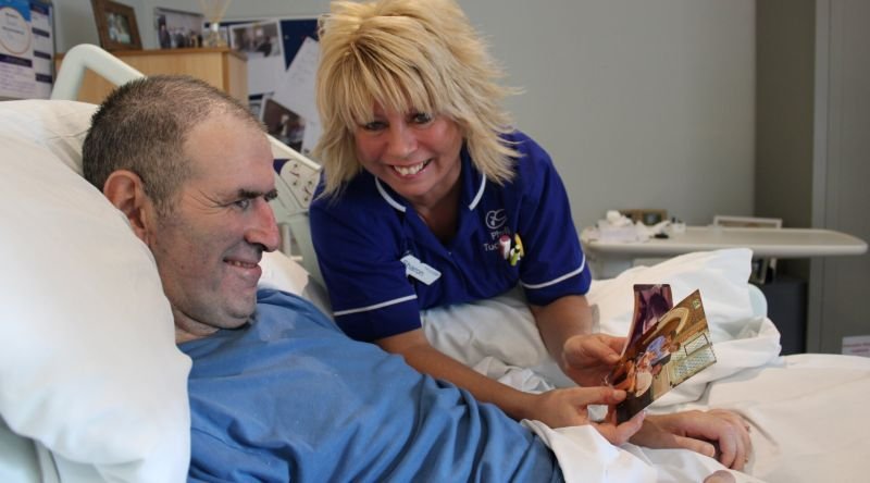 Two people holding hands