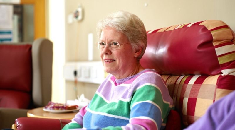 Anne sitting in a chair