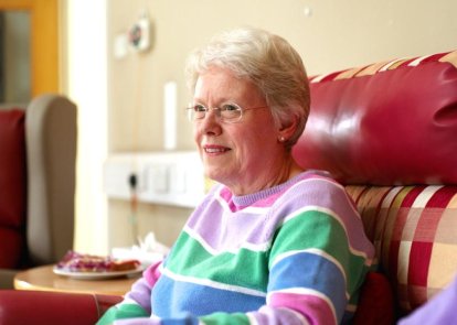 Anne sitting in a chair