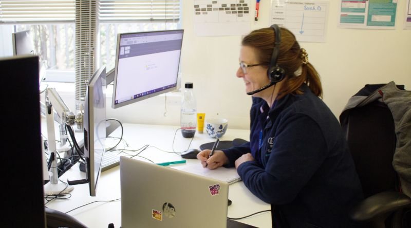 Clinical nurse specialist at desk