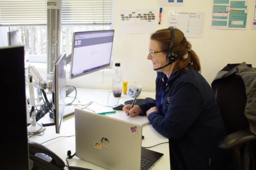 Staff member at desk
