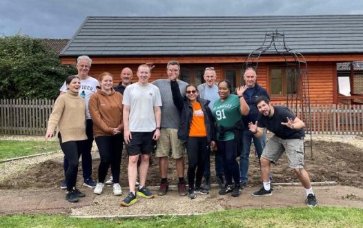 A team of corporate supporters helping in the garden
