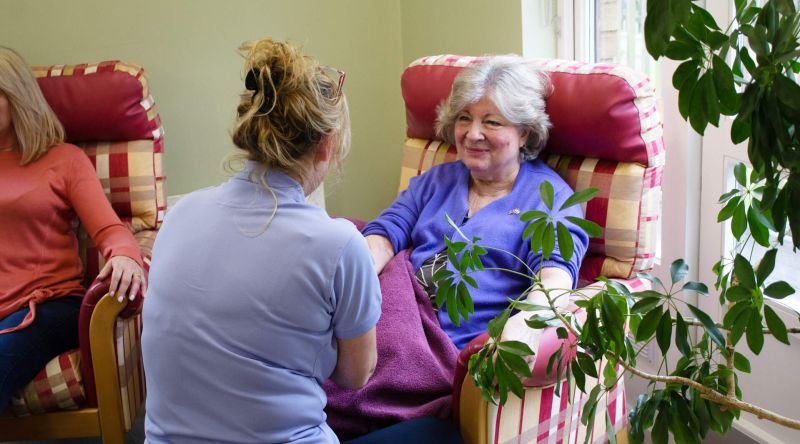 Complementary therapist with carer