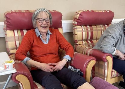 Carer having foot massage