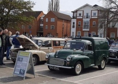 People looking at classic cars