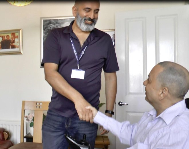 Clive and Zul shaking hands