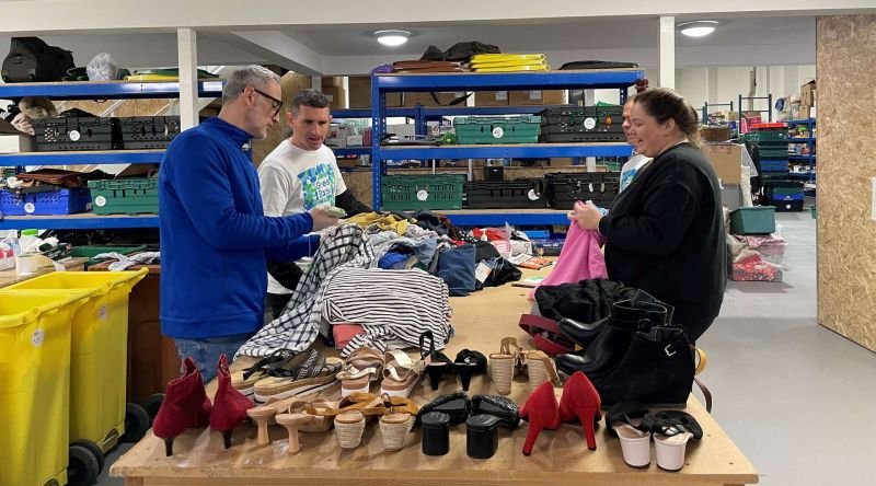 People sorting through donated stock