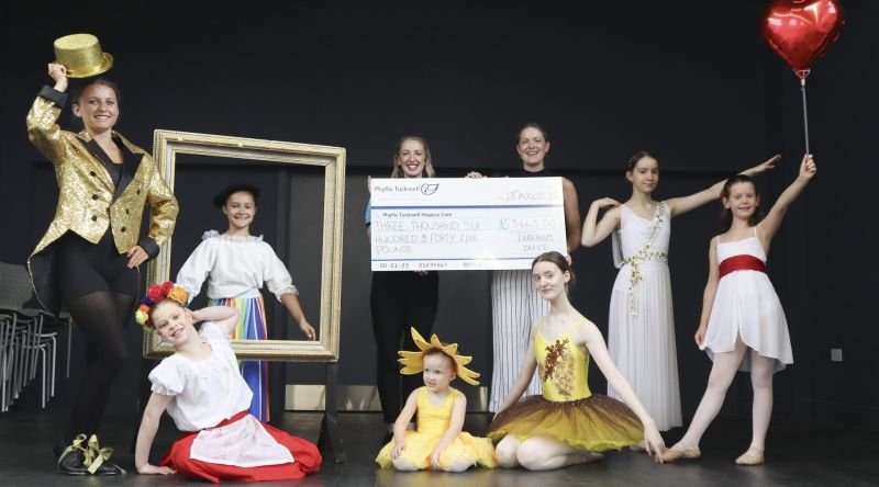 Dancers and a big cheque