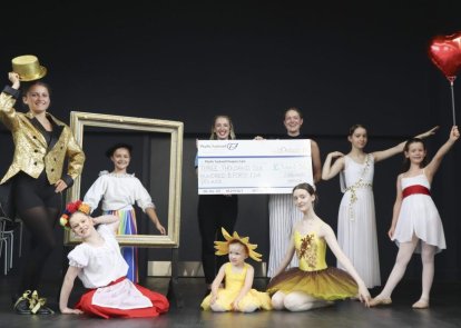 Dancers and a big cheque