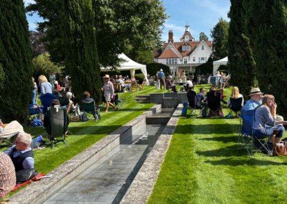 People picnicking in the sunshine