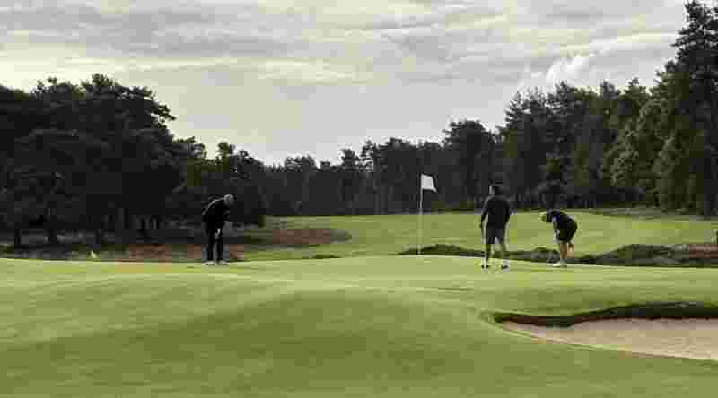 People playing golf