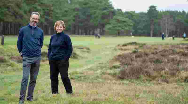 Two people on golf course