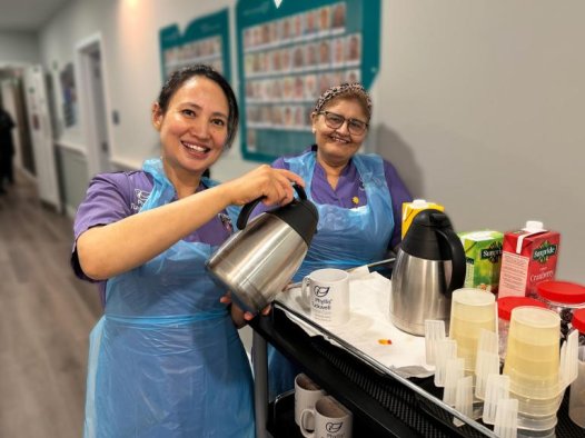 Housekeeper with trolley
