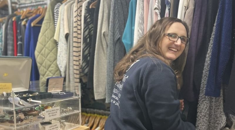 Retail assistant in shop