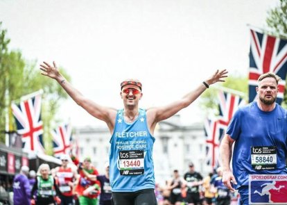 Marathon runner cheering