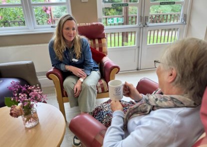 Two people sitting talking