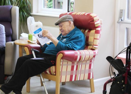 Patient reading sleep management leaflet