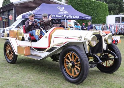 People in classic car