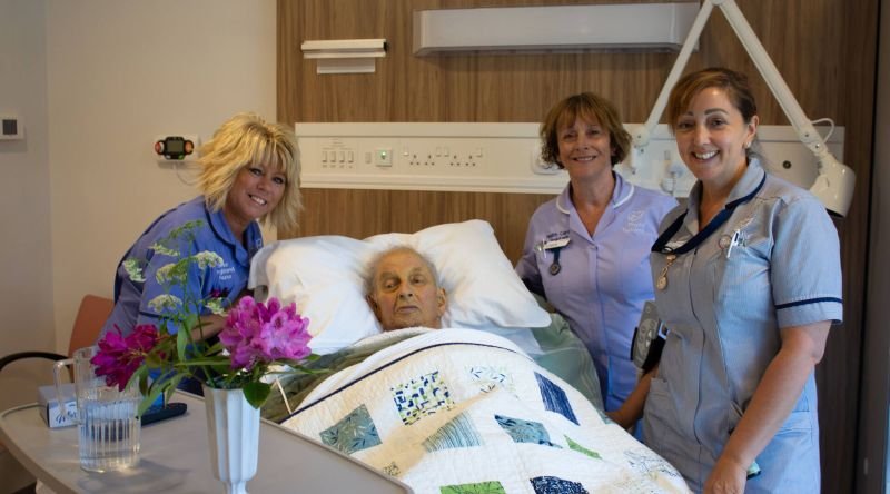 A patient with nursing staff