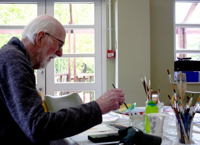 Peter painting at a Living Well session