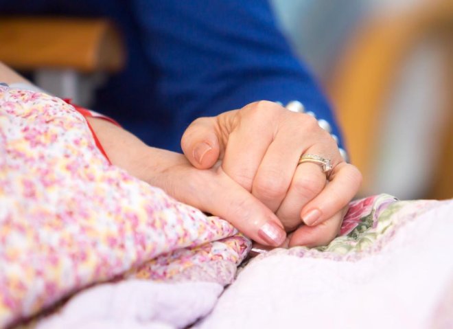 Loved ones holding hands