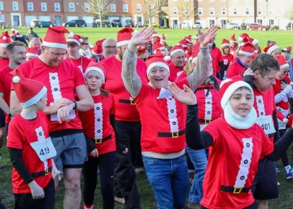 Runners in Santa t-shirts
