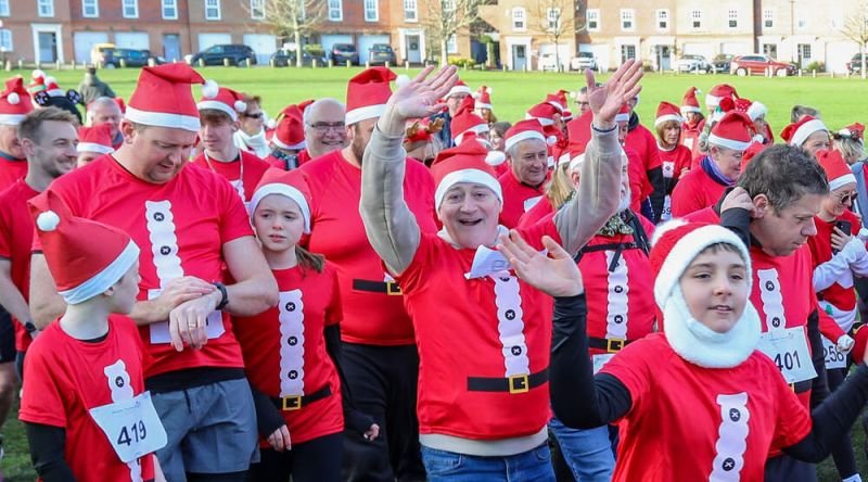 Runners in Santa t-shirts