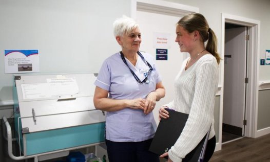 health care assistant with student