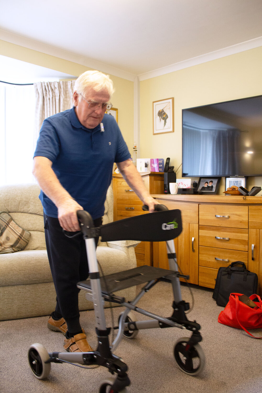 Colin using a walker