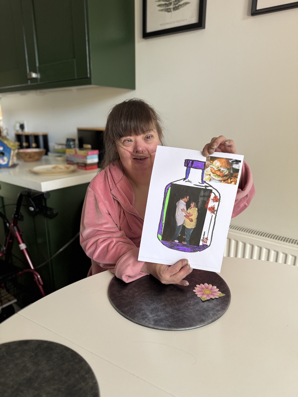 Emma holding a picture