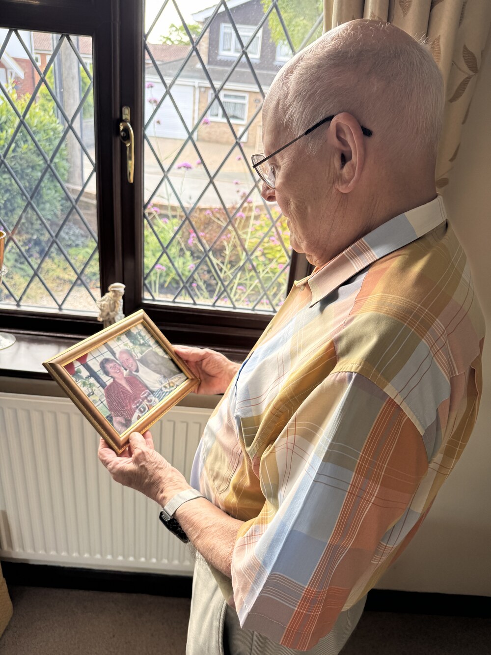 John looking at a photo