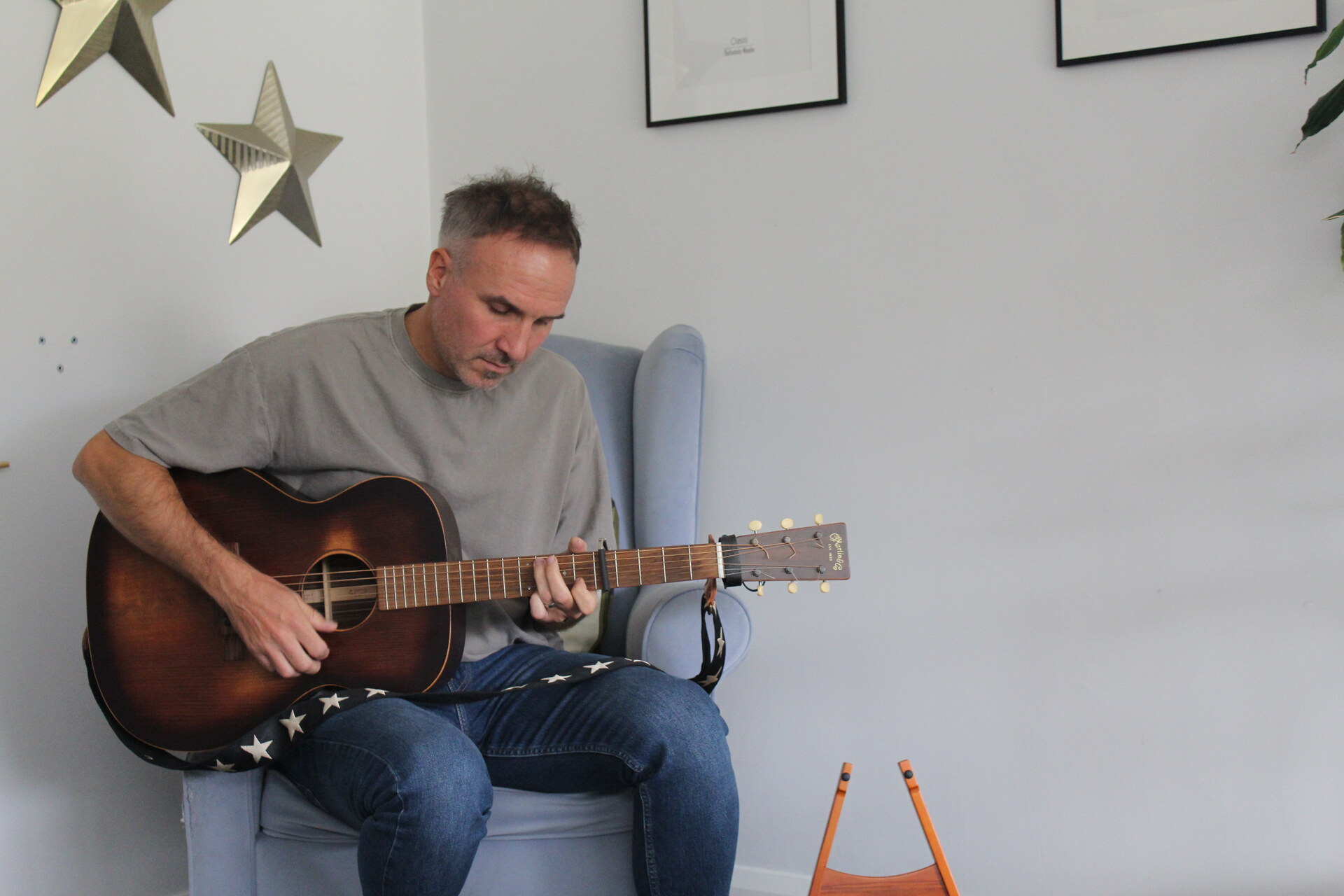 Kevin playing his guitar