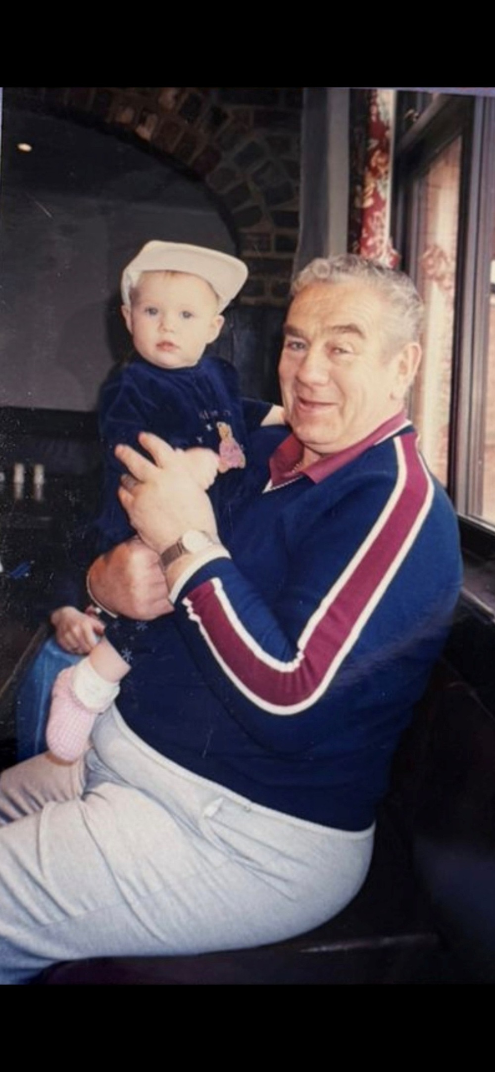 Peter with his granddaughter