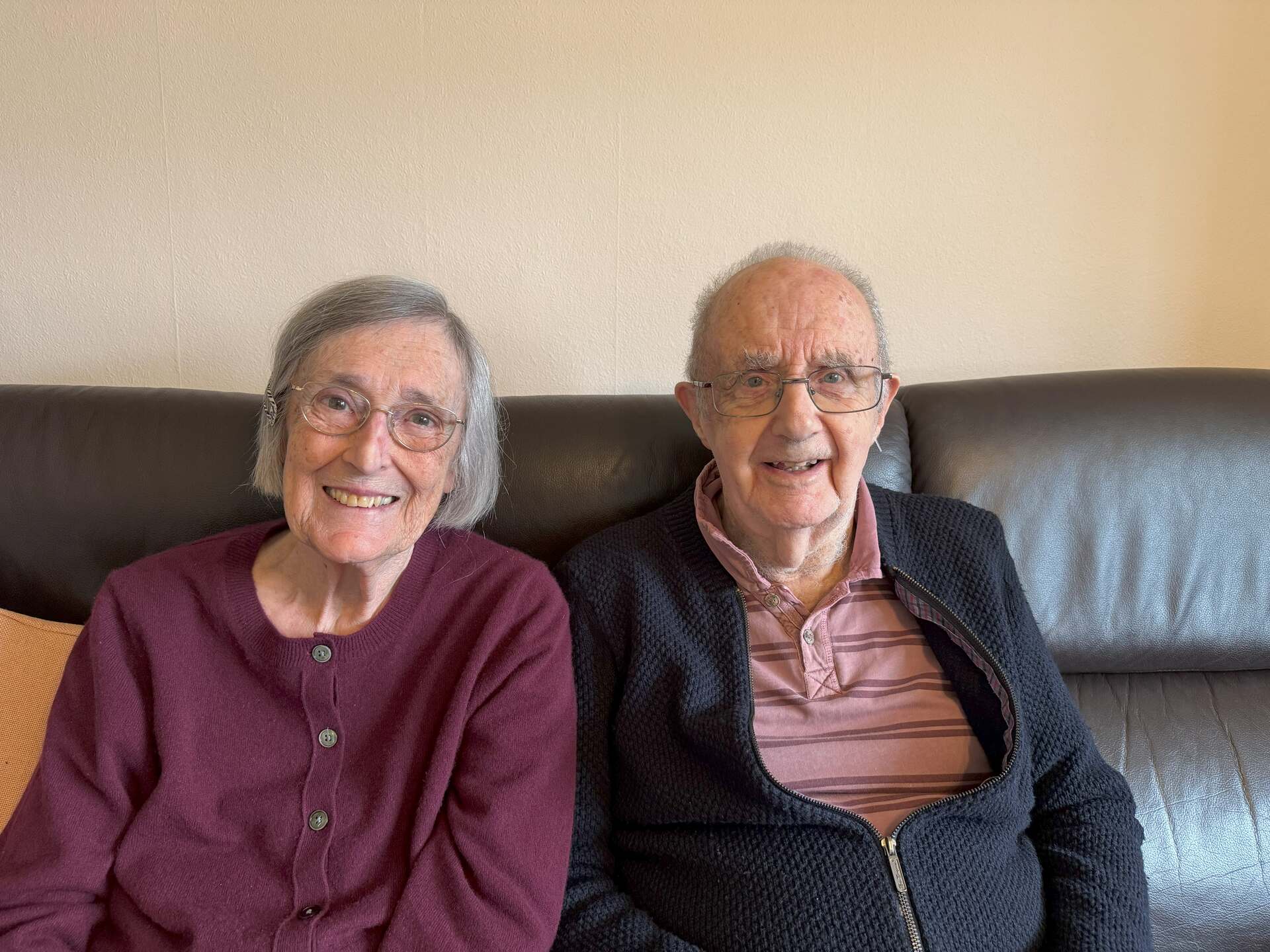 Two people sitting together