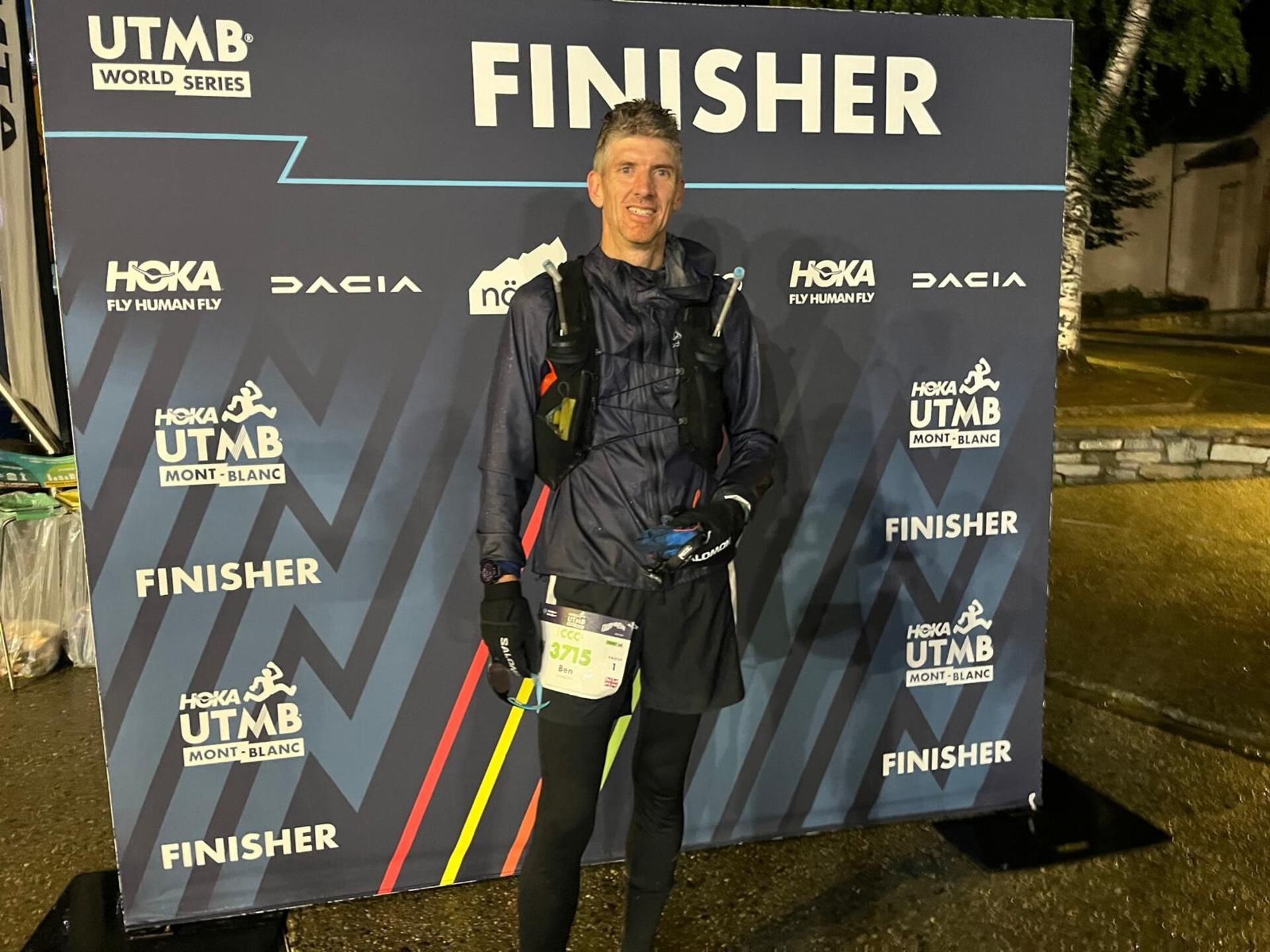 Ben at Finishers sign