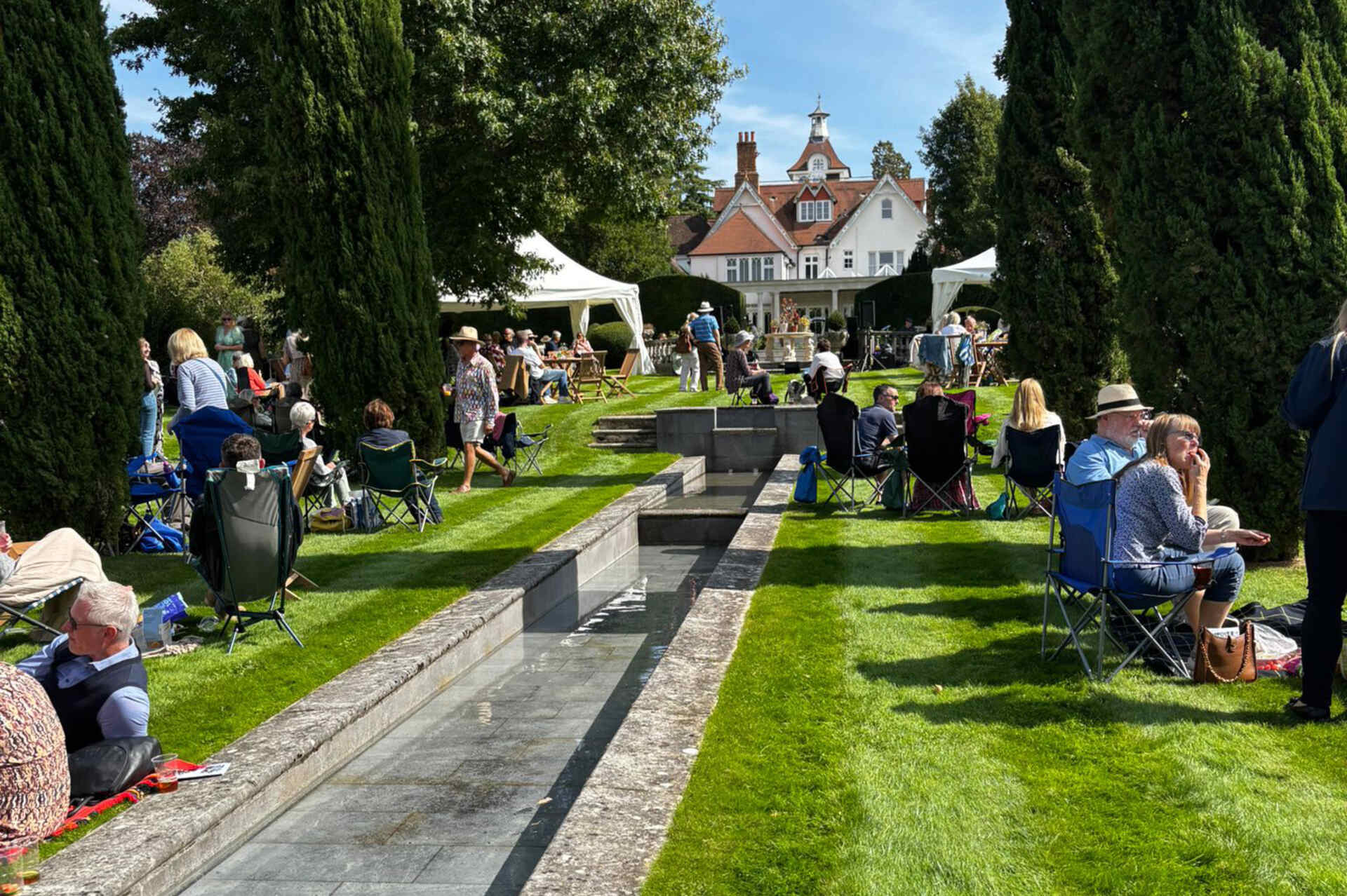 People picnicking in the sunshine