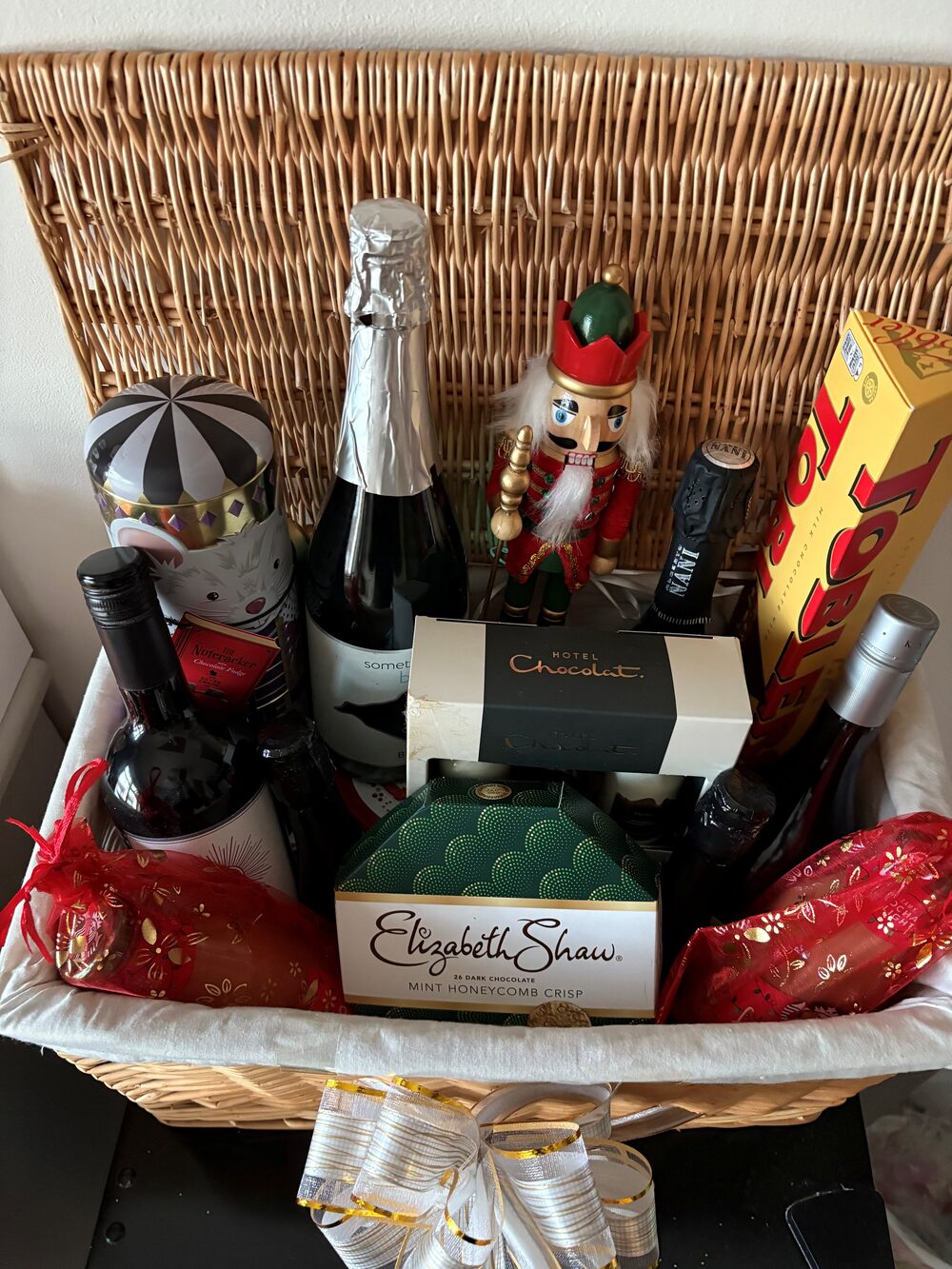 A hamper filled with wine and chocolates
