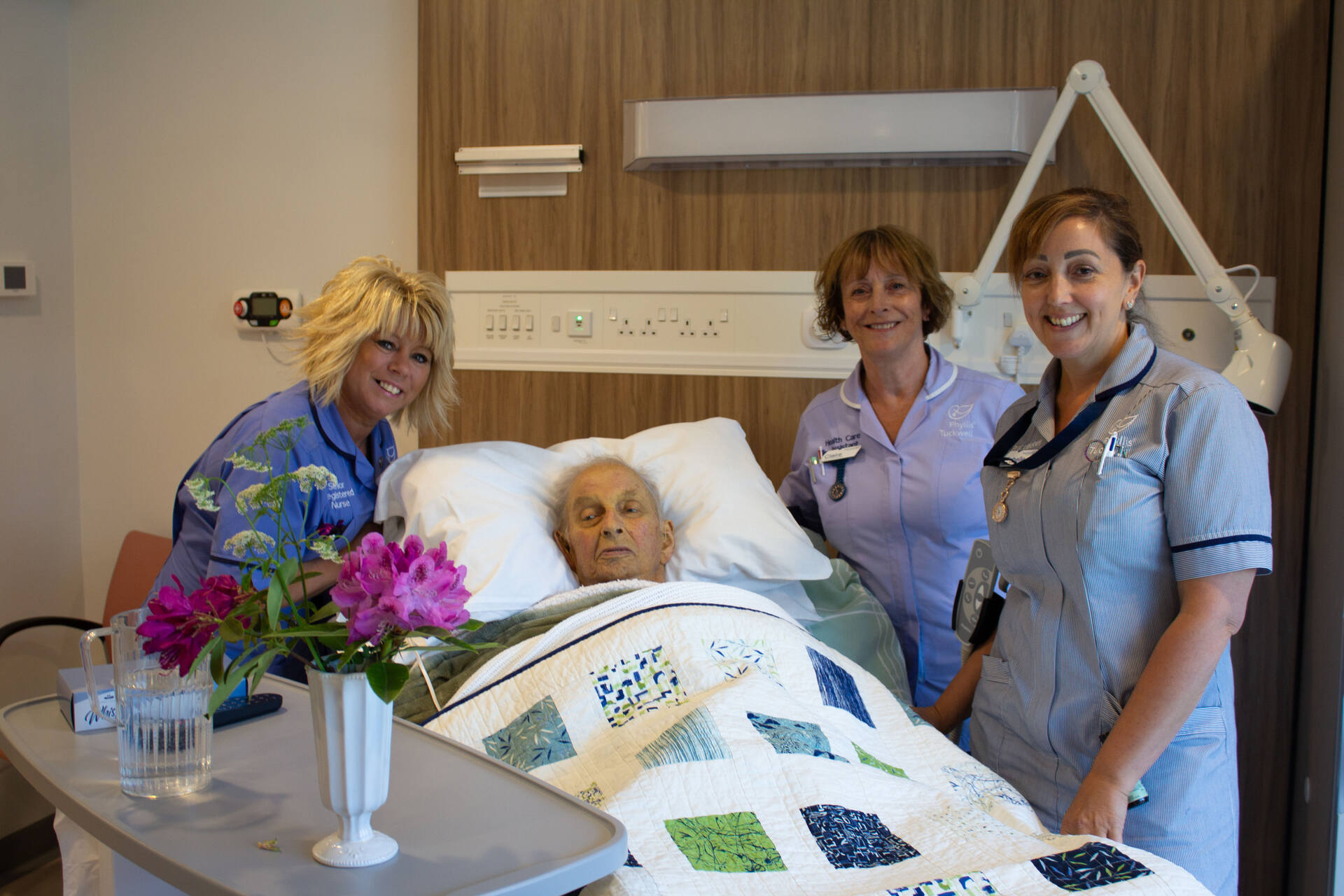 A patient with nursing staff