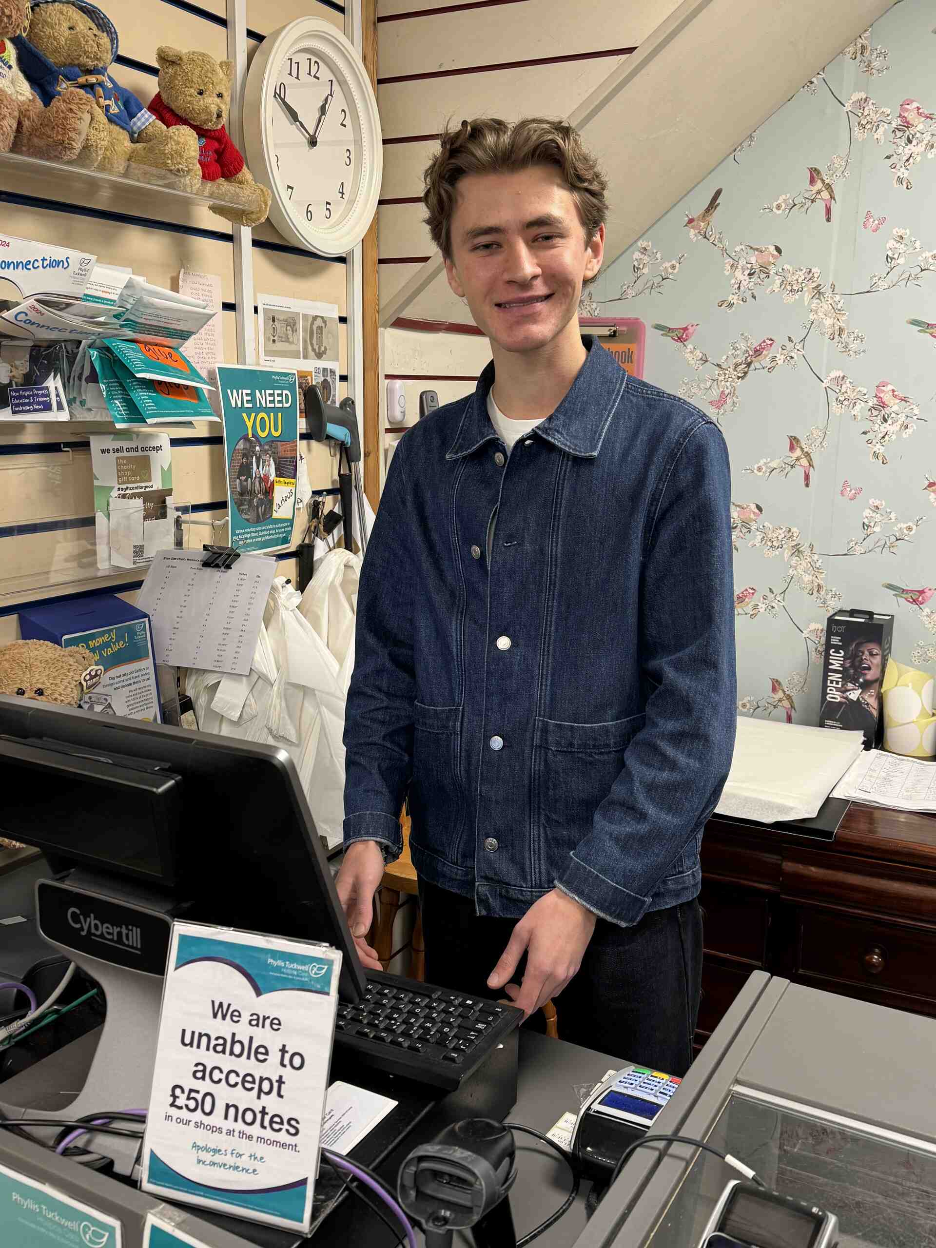 A volunteer in a shop
